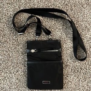 TUMI black nylon w/ leather trim crossbody. Excellent condition! Unisex.